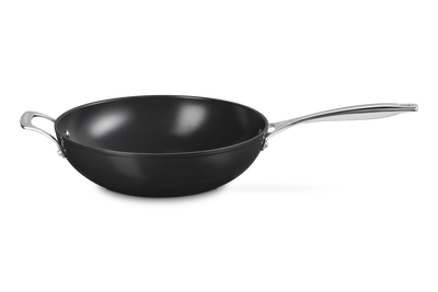 Black stir-frying pan with long handle and helper handle
